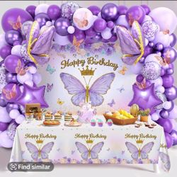 Fabric Backdrop And Plastic Tablecloth. Butterfly Theme
