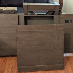Grey desk with standing desk conversion section