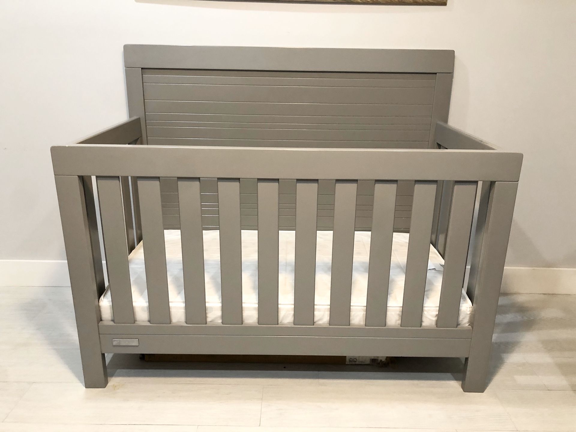 Simmons Kids SlumberTime Rowen by Delta 4-in-1 Convertible Baby Crib, Mattress included.