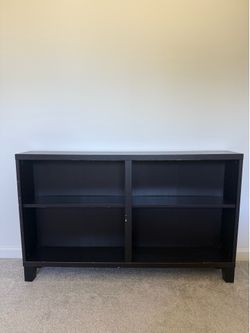 Bookshelf in a black brown finish