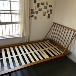 Twin Size Brown Wooden Bed