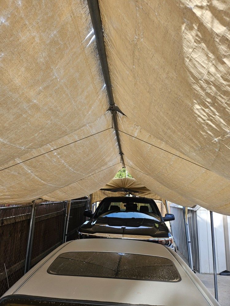 Galvanize twenty feet long by ten feet wide car Port.r