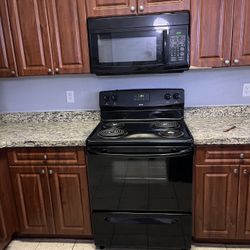 Set Of Two Electric Stove/Oven And Above Counter Microwave Oven (kenmore”