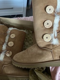 Brown button Ugg boots