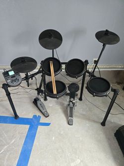 Alesis Nitro Electronic Drum Set and Drum Amp