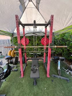 Full gym REP fitness Rogue air bike rogue sled. Cast iron dumbbells 15lbs to 60lbs