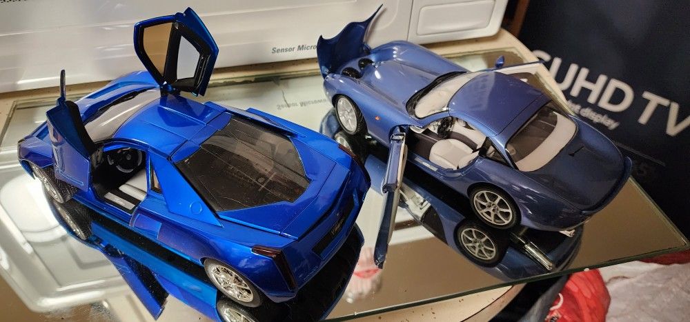 (2) 1/18th scale model cars