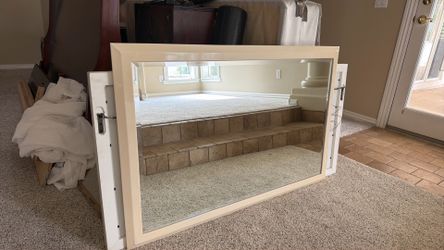 Cream framed beveled mirror 30”x 46”