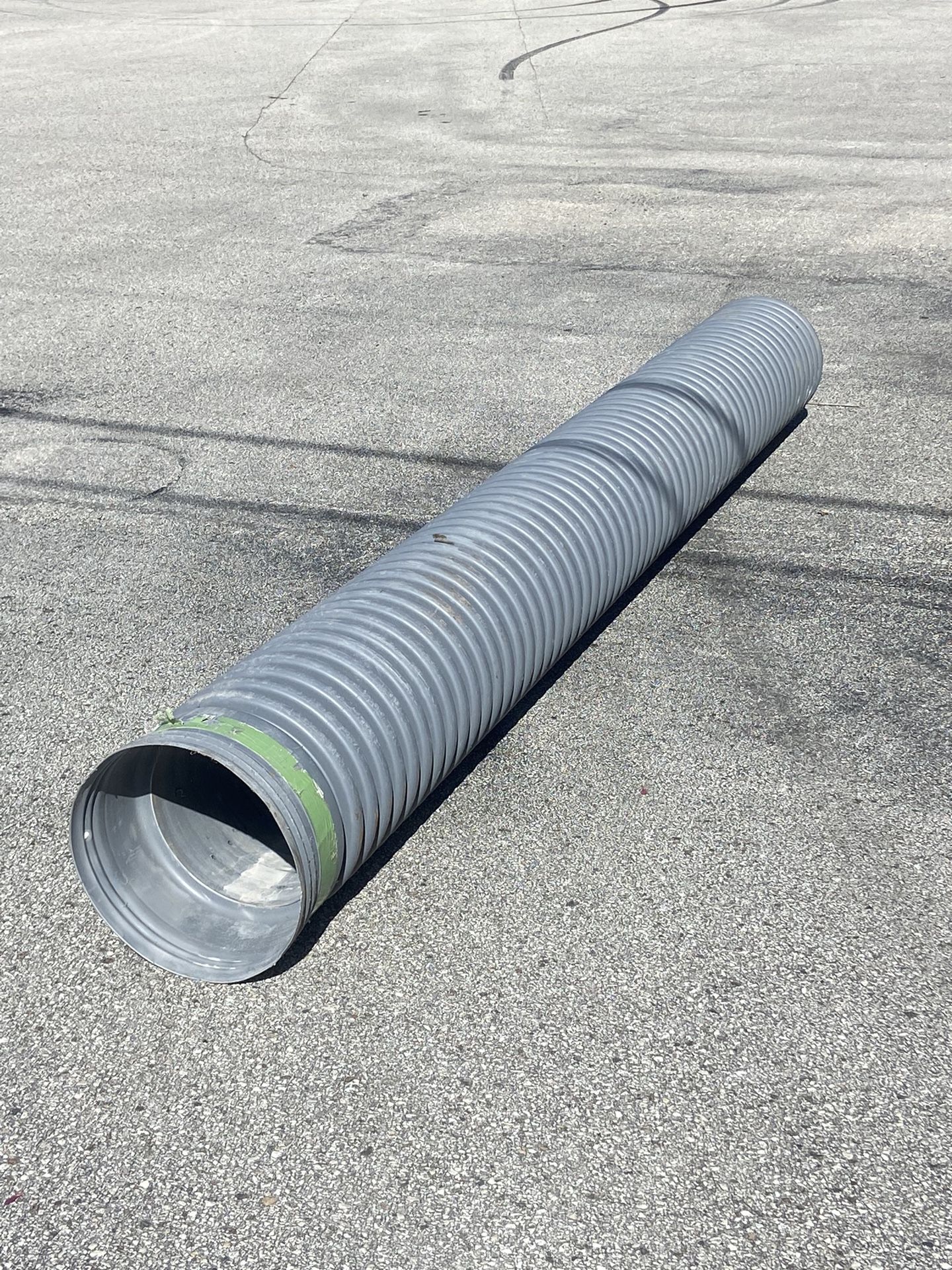 12 Inch Inside Dia Corrugated Plastic Culvert Pipe With Drain Holes. 10 Foot Long With Bell On One End.