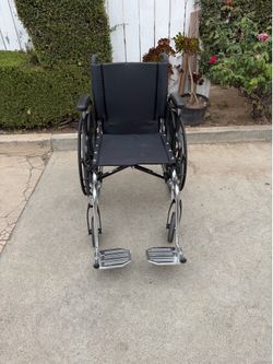 18 inches wide wheelchair in excellent condition  easy to fold