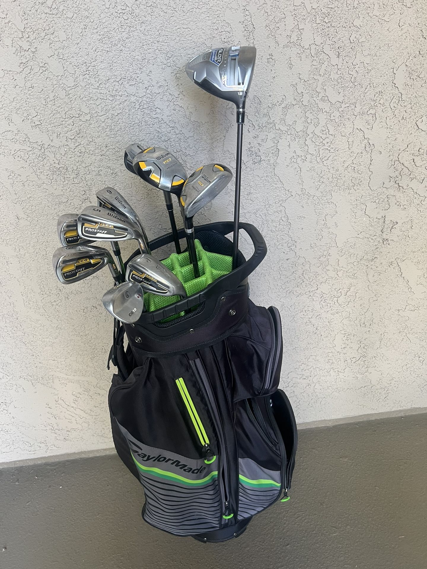 Wilson Golf Clubs. With Taylormade Driver.