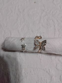 Rhinestone butterfly and star rings both for