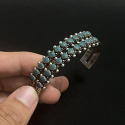 Sterling Silver Bangle With Turquoise Stones