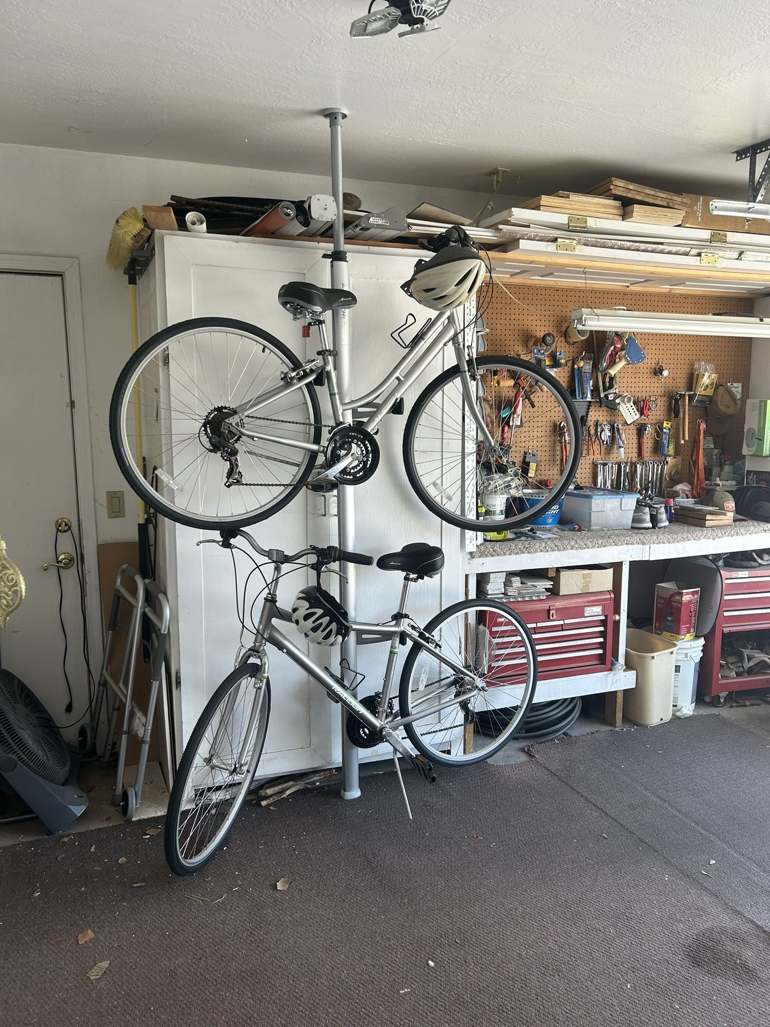 Two Raleigh 3.5 Men’s And Ladies Speed Bikes With Helmets Storage Rack