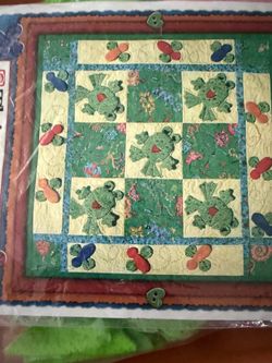 Material to make a frog quilt