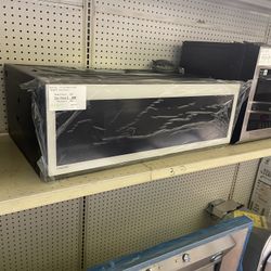 Low profile microwave Samsung 30 inch wide white glass finish