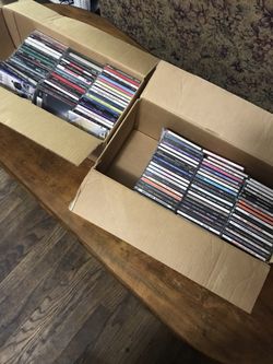 CDs of various genre music / New And Light Use.
