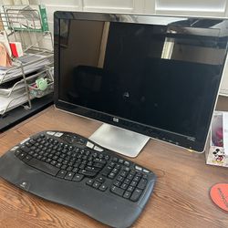 Computer Monitor And Ergonomic Keyboard 