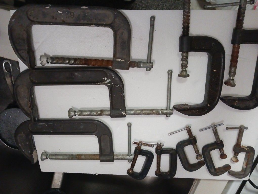 Five. 2in. C Clamps Three 9in. C Clamps And Two 4in Clamps 