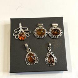 925 Sterling Silver Natural Amber pendants $25 each 