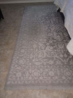 Area rug 8 by 10 grey and off white 25.00