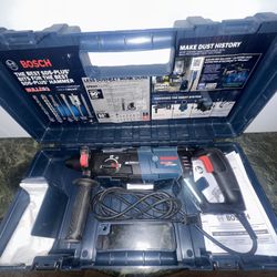 Bosch concrete/masonry Rotary Hammer Drill with carrying case.