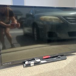 TV  24 tall by 38 across  Color TV 