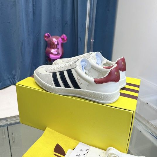Women's adidas x Gucci co-branded Gazelle sneakers