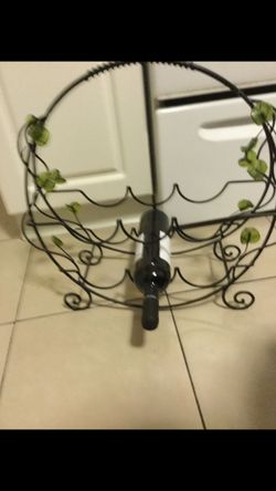 Metal countertop wine rack storage. Holds 6 bottles of wine