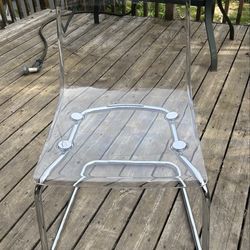 4 like new Tobias clear and chrome coated IKEA chairs