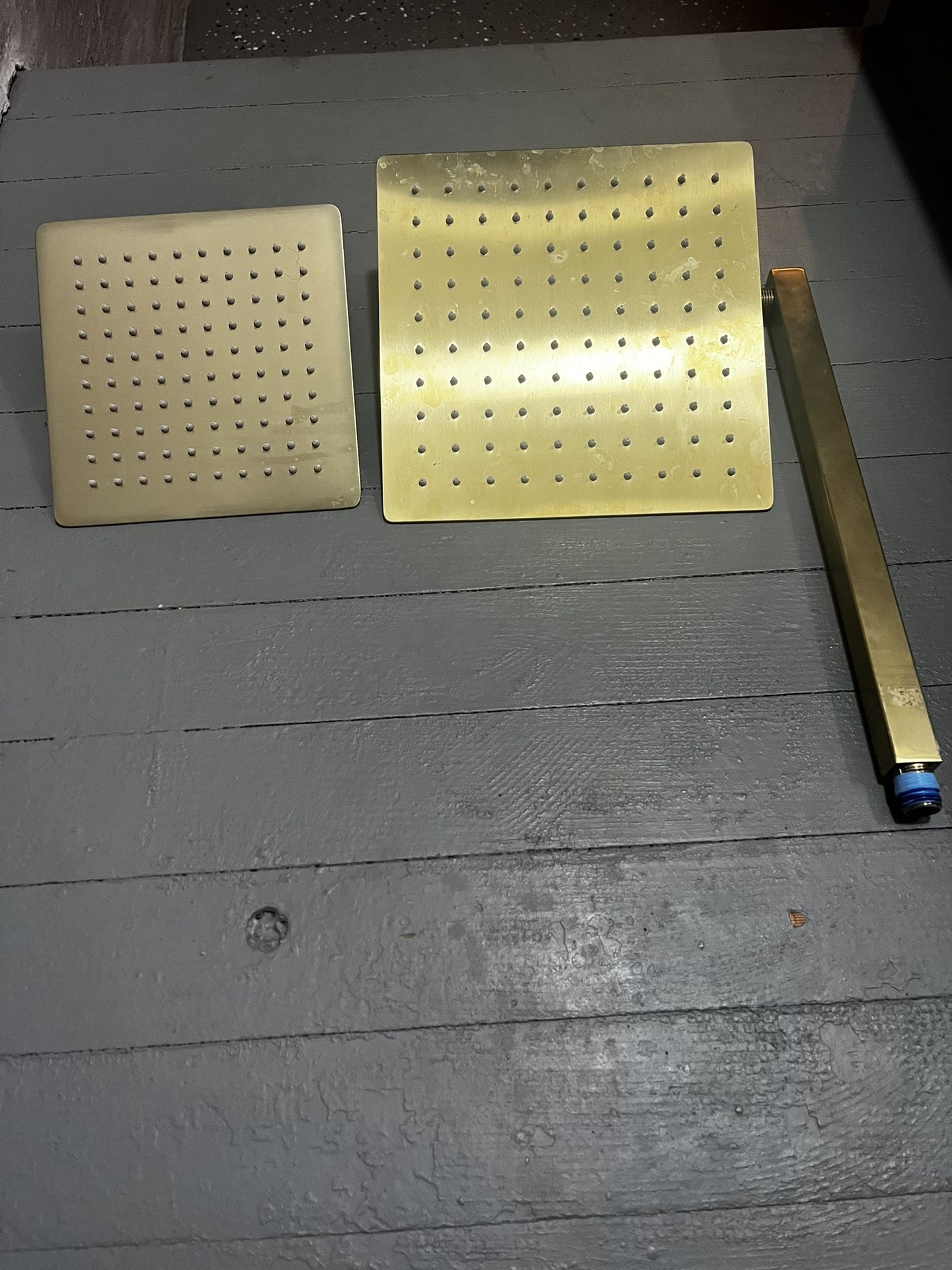 Two polishes brass rain shower heads