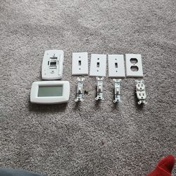 Thermostat, outlet, light switches, cover plates