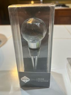 a Dashing Fine Gifts Diamond Cut / Crystal Ball Wine Stopper packaged in a clear plastic gift box