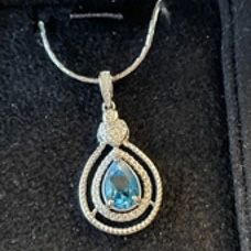 New, Firm, SS Teardrop Halo Pendant with an 8x10mm Pear Swiss Blue Topaz and an 18-in SS Chain