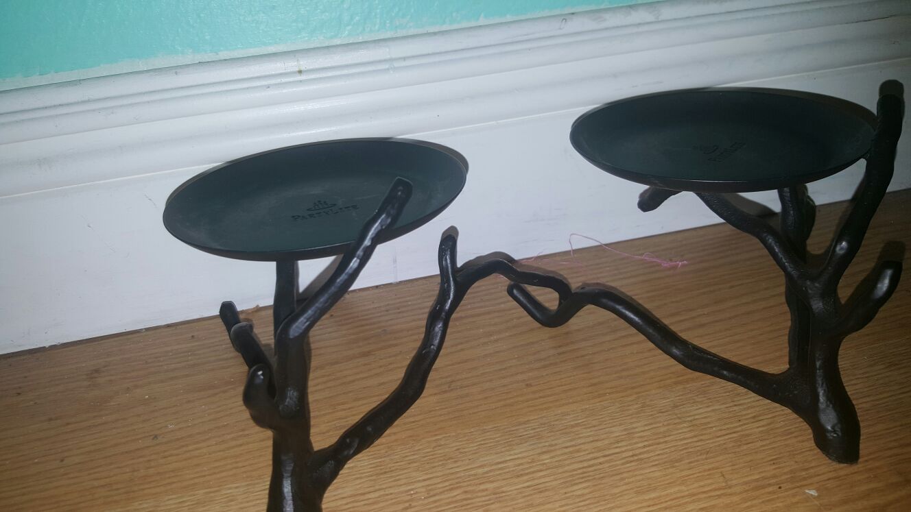 Black partylite pillar candle holders..set of 2....like new!