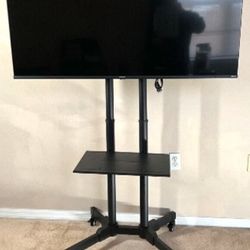 HISENSE 50" Class UHD 4K (2160p) Roku Smart LED TV (50R6E4) with tv stand & remote