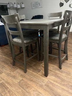 Dining table with four chairs