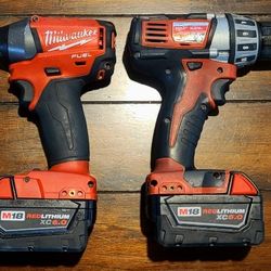 Milwaukee Tool Bundle – M12 Spotlight (New), M18 Drill, M18 Impact, XC5.0 + XC6.0 Batteries