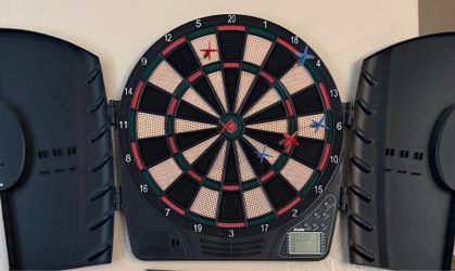 Dart board with darts