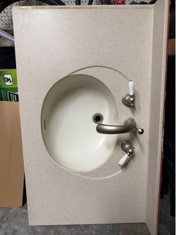 Bathroom vanity top with sink