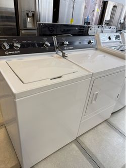 Speed Queen Tod load washer and electric dryer set
