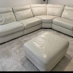 Leather recliner sofa sectional.