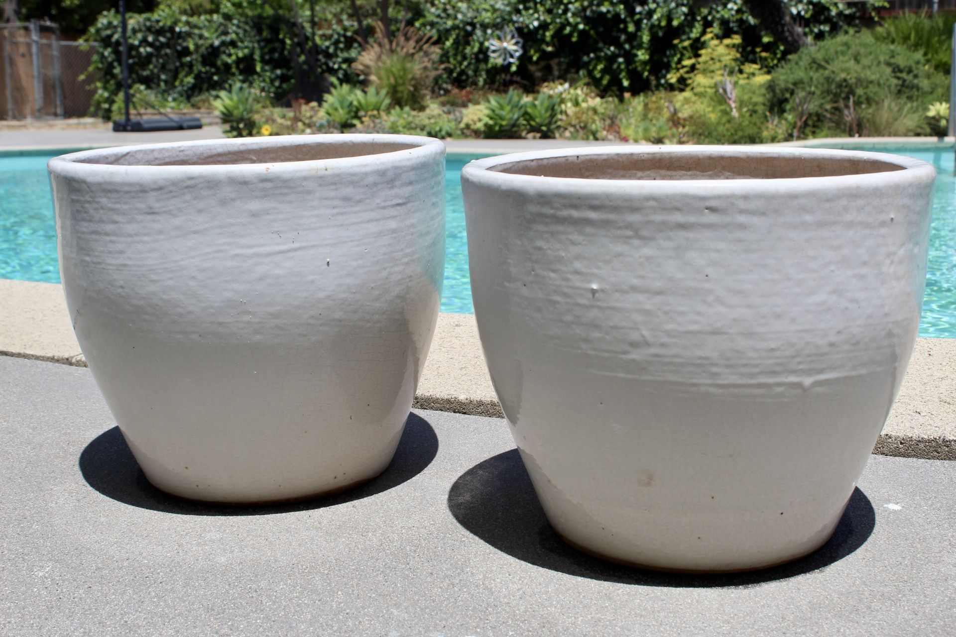 A Pair Of Ceramic Pots