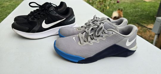2 Pairs Women's nike athletic shoe.