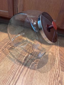 Large glass angled jar.
