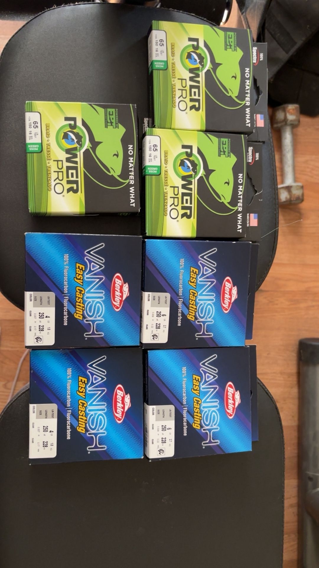 Three Boxes Of Power Pro Braided Line 65 Pound two boxes of 6 pound vanish, fishing line 2 boxes of 4 pound vanish fishing line
