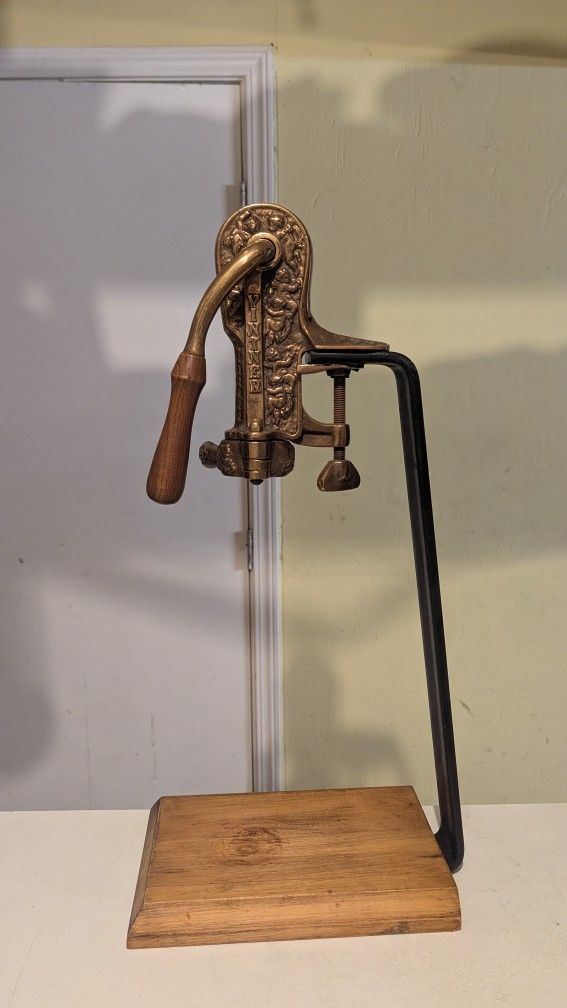 Vintner  mechanical table-mounted corkscrew.