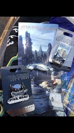 Star Wars Galaxys Edge opening day pins with opening day laminated map