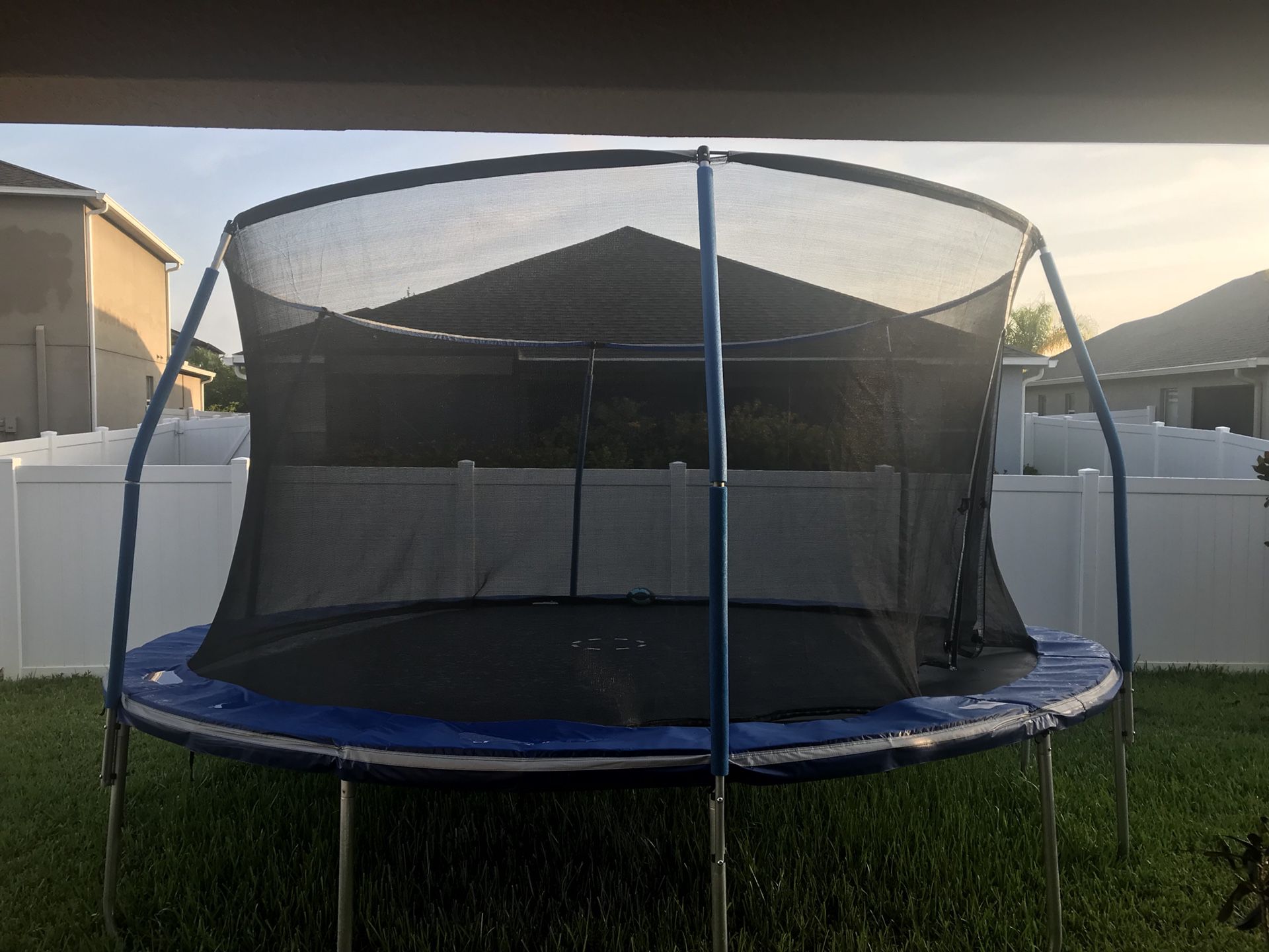 15’ Trampoline with Net and Basketball Hoop.