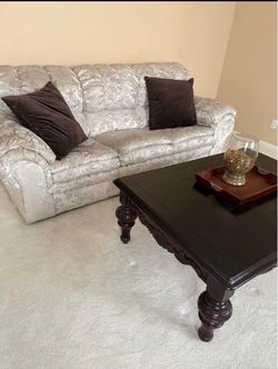 Floral Fabric Sofa with Dark Wood Coffee Table